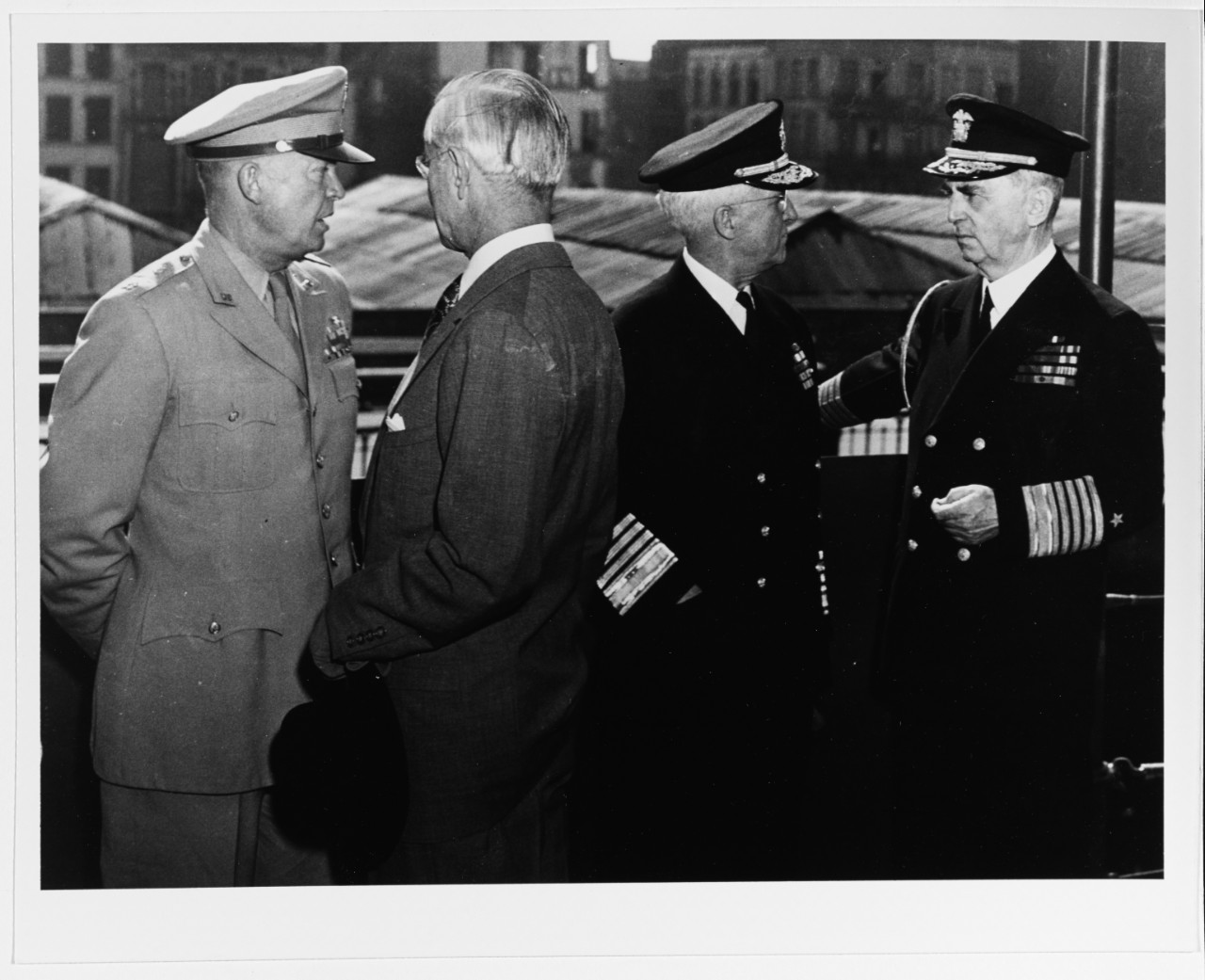 Photo #: NH 93315  General of the Army Dwight D. Eisenhower; U.S. Ambassador to Belgium Charles Sawyer; Admiral Harold R. Stark, USN; Fleet Admiral William D. Leahy, USN;