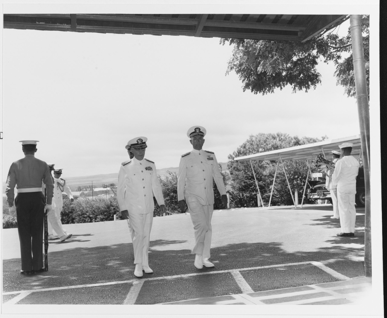 Admiral U.S. Grant Sharp, USN (left), and Admiral Thomas H. Moorer, USN