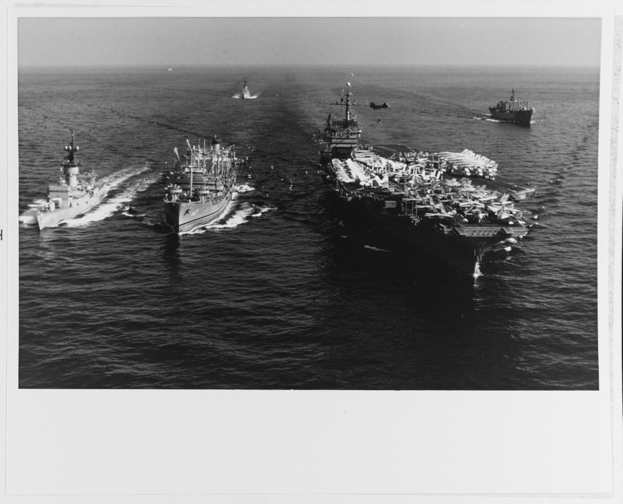 USS JOHN F. KENNEDY (CV-67) and USS THOMAS C. HART (FF-1092)