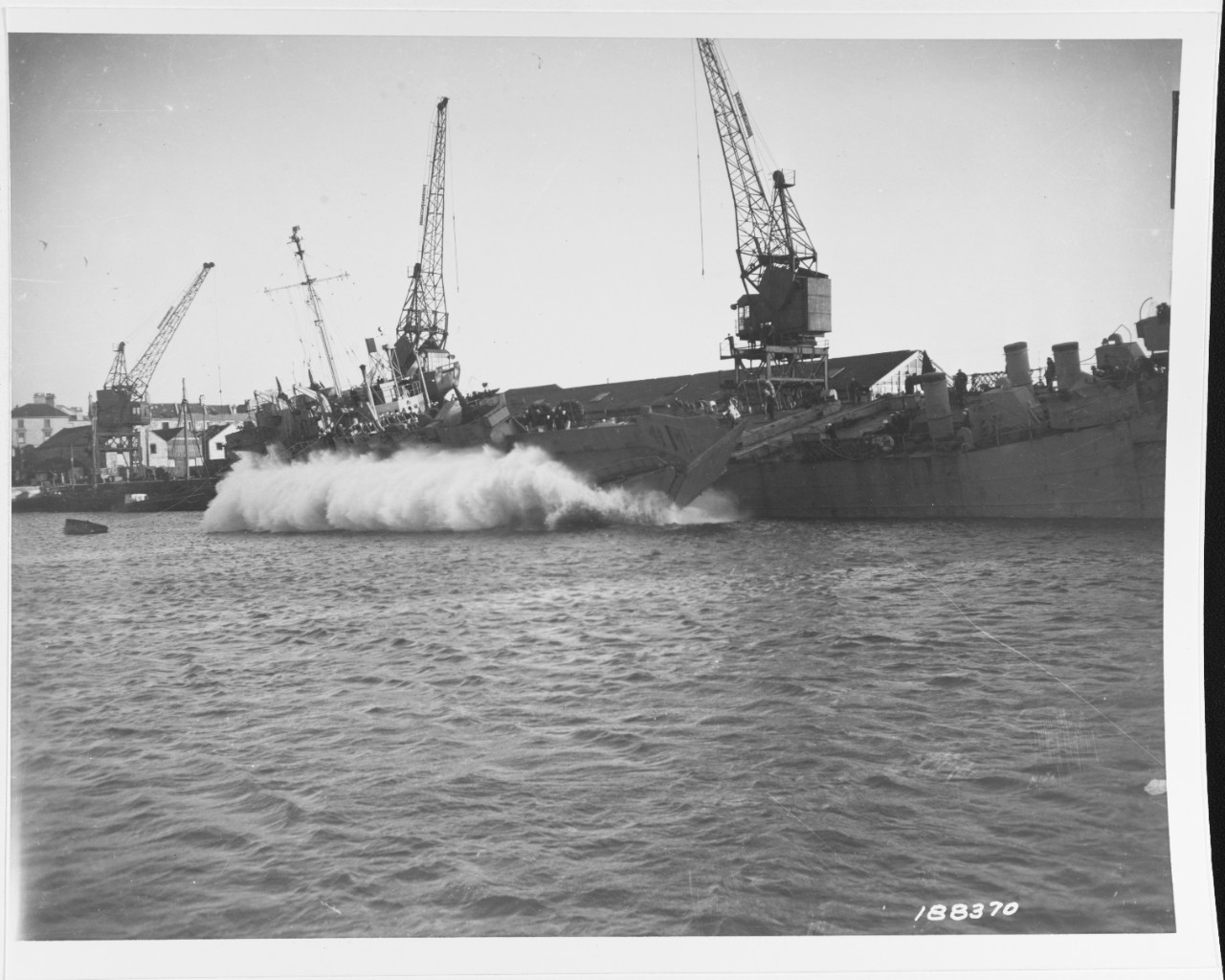 Landing Craft, Tank (Mk6) (LCT) is launched from the deck of an LST, at an English port, 1944.