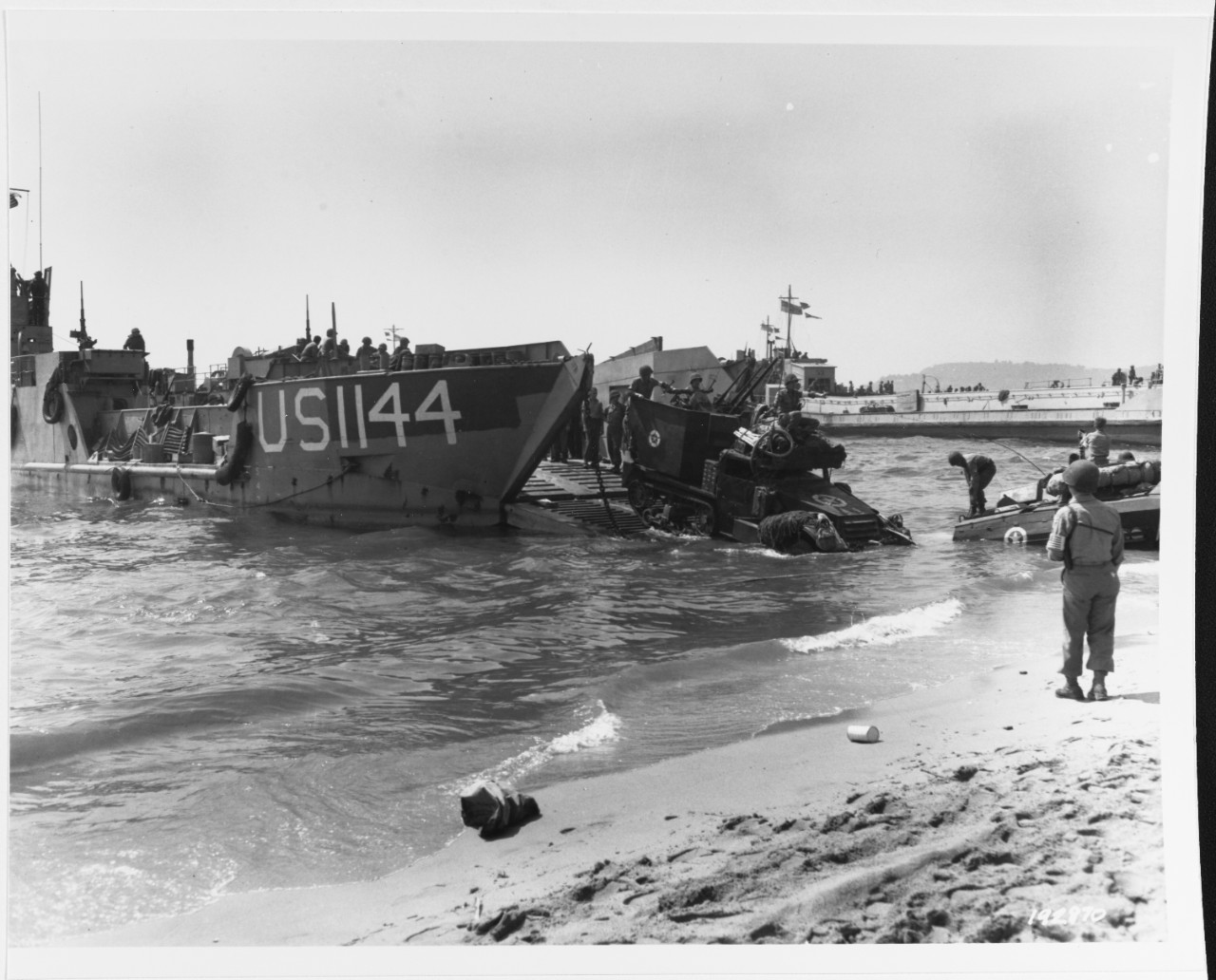 Southern France Invasion, August 1944. Anti-aircraft machine gun half-track comes ashore from USS LCT-1144