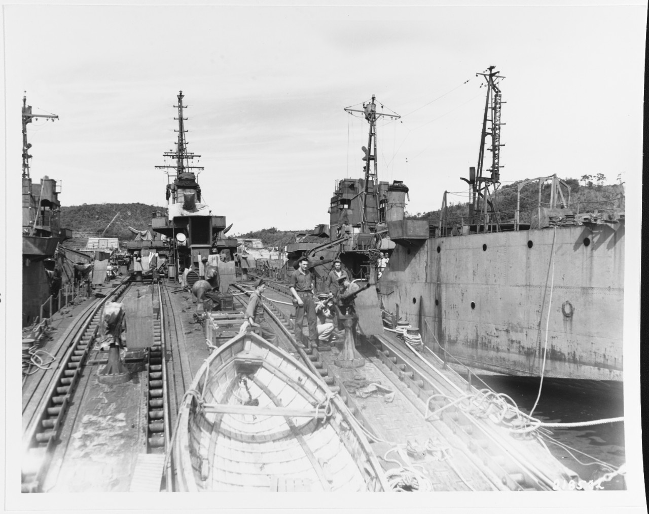 Japanese Landing Ships being disarmed by U.S. personnel at Sasebo, Japan. October 19, 1945