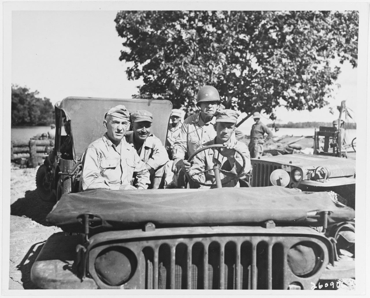 Lieutenant General Walter Krueger, Major General William Chase, Major General Innis P. Swift, start out on an inspection tour of Momote, Los Negros Island, Admiralty Group, March 18, 1944