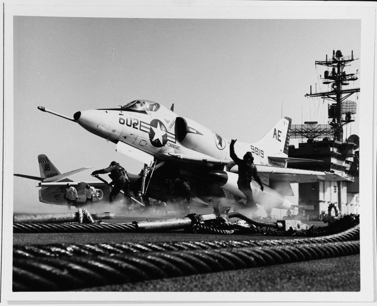 An A-4C "Skyhawk" is positioned on the catapult of the USS AMERICA (CVA-66)