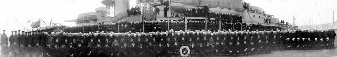 Oversize panoramic of officers and crew of USS North Dakota (BB-29) on and alongside their ship at Boston Navy Yard, MA, December 11, 1922. From the RADM Bradford Bartlett Collection.