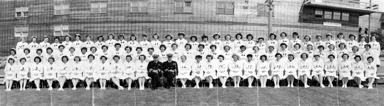 Oversized panoramic image of a group nurses at naval hospital, San Leandro, CA, circa 1940s. All present are identified with ID numbers penned in on each person. 