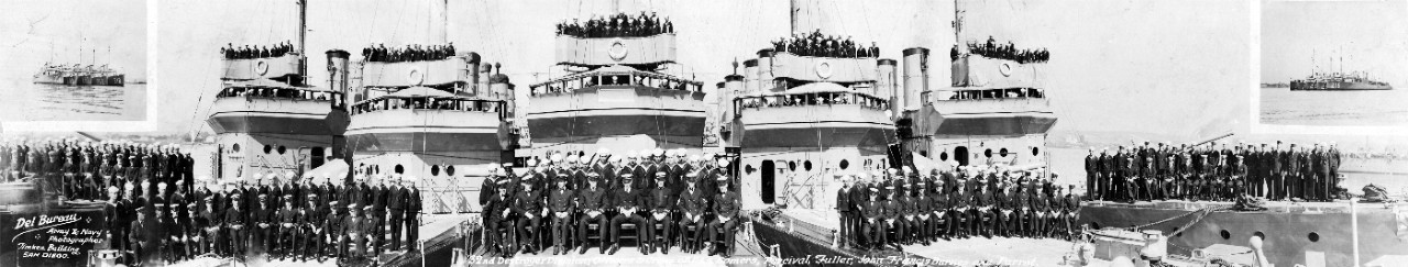 Oversize panoramic of the officers and crew of the 32nd Destroyer Division, including: USS Somers (DD-301); USS Percival (DD-298); USS Fuller (DD-197); USS John Francis Barnes (DD-299) & USS Parrott (DD-218). Image most likely taken in San Diego, CA. 