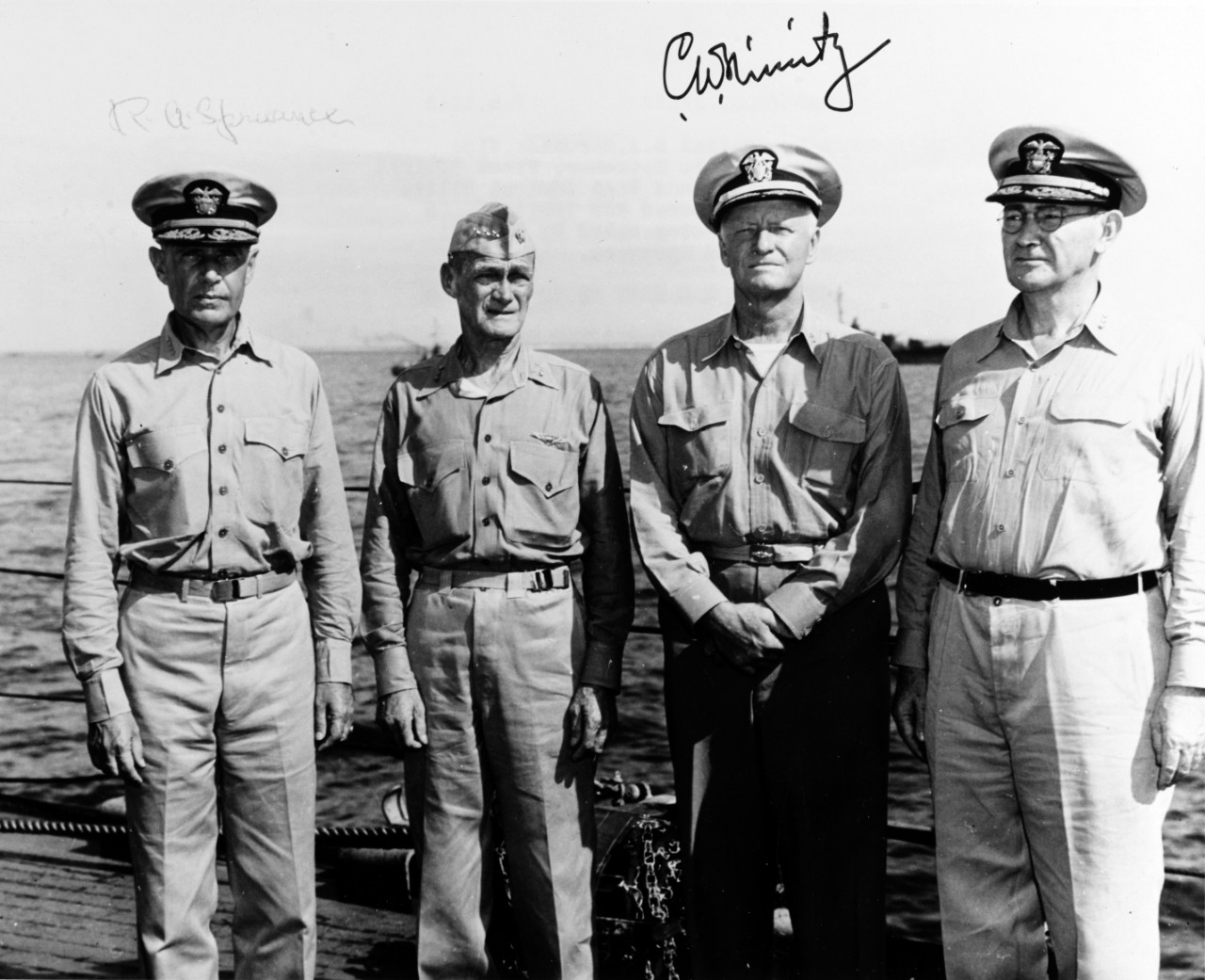 NH 49705  Admiral Raymond A. Spruance, Vice Admiral Marc A. Mitscher, Fleet Admiral Chester W. Nimitz and Vice Admiral Willis A. Lee, Jr. (listed from left to right)