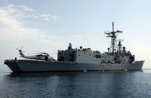 Photo of USS Thach with helicopter on deck