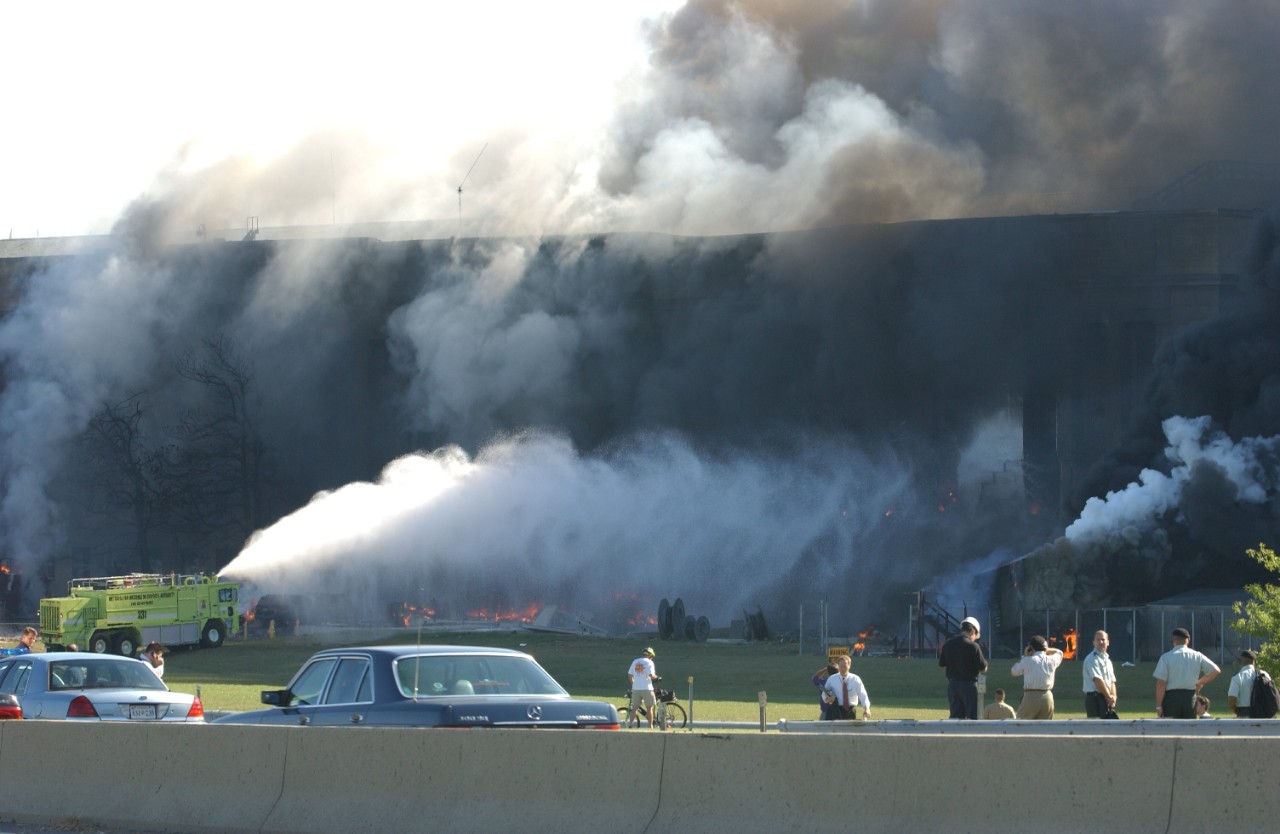 The Pentagon in flames moments after a hijacked jetliner crashed into building at approximately 0935 on 11 September 2001