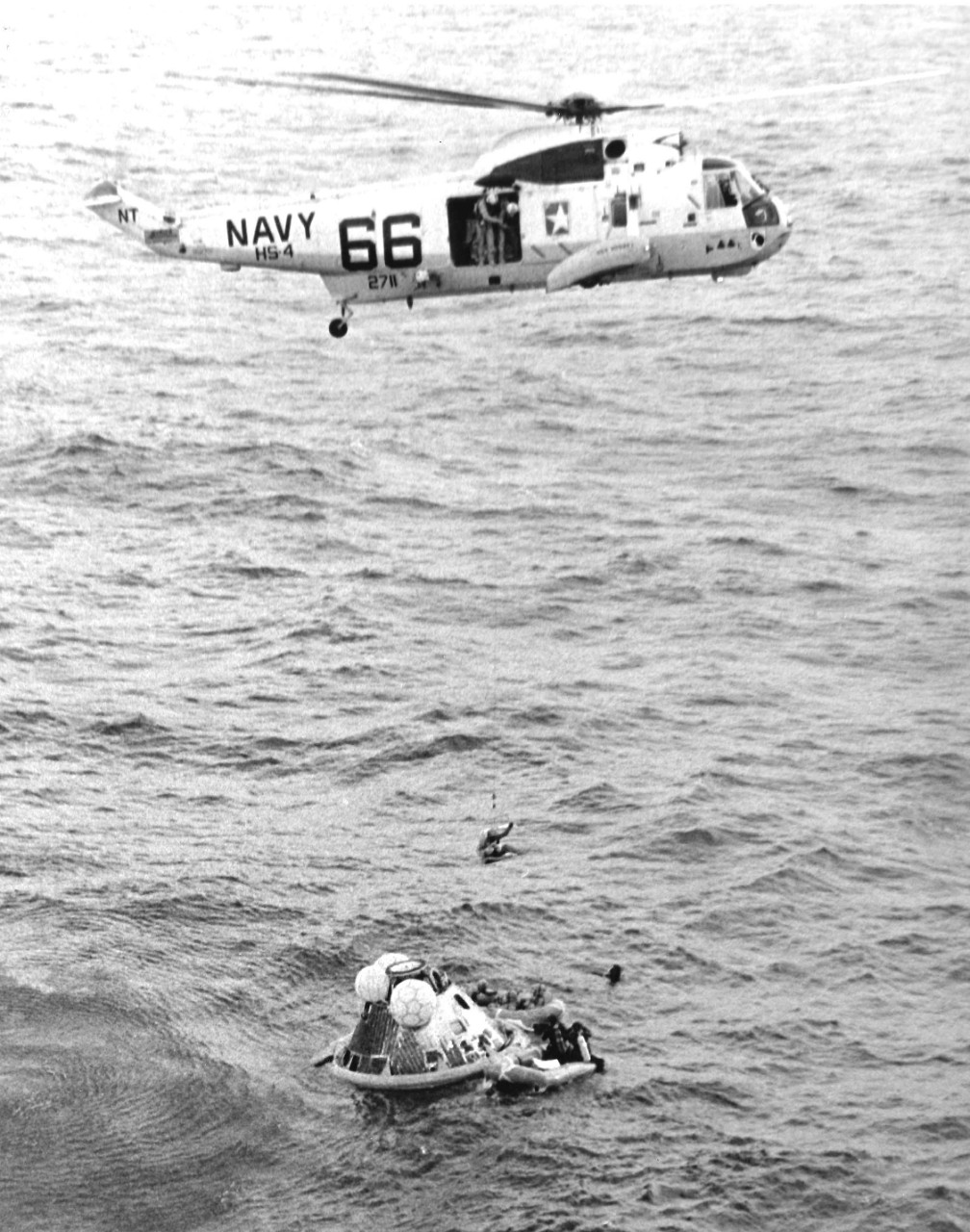 <p>A helicopter&nbsp;picks up the astronauts from the&nbsp;Apollo 11 Command Module in the Pacific.</p>
