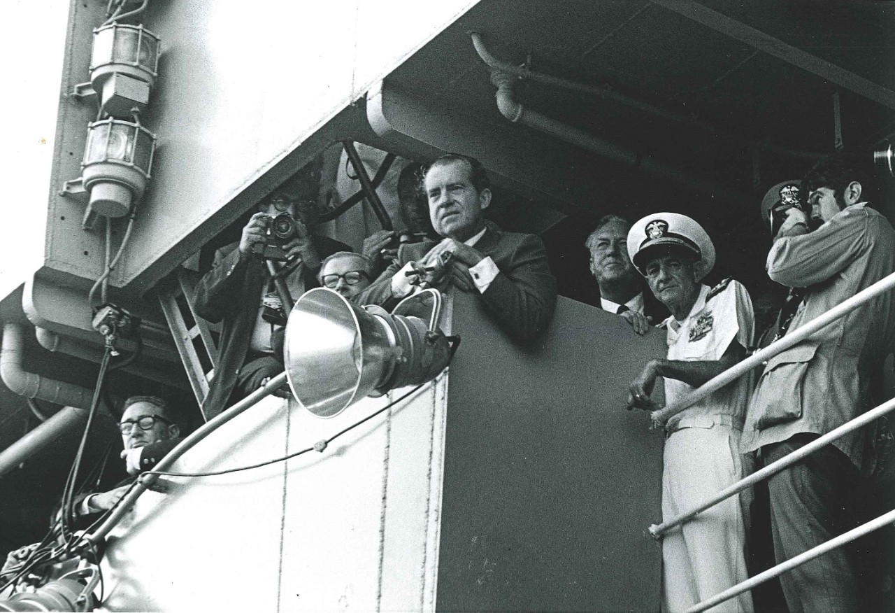 <p>President Richard M. Nixon watches the recovery of Apollo 11 from the bridge of USS Hornet (CVS-12).&nbsp;</p>
