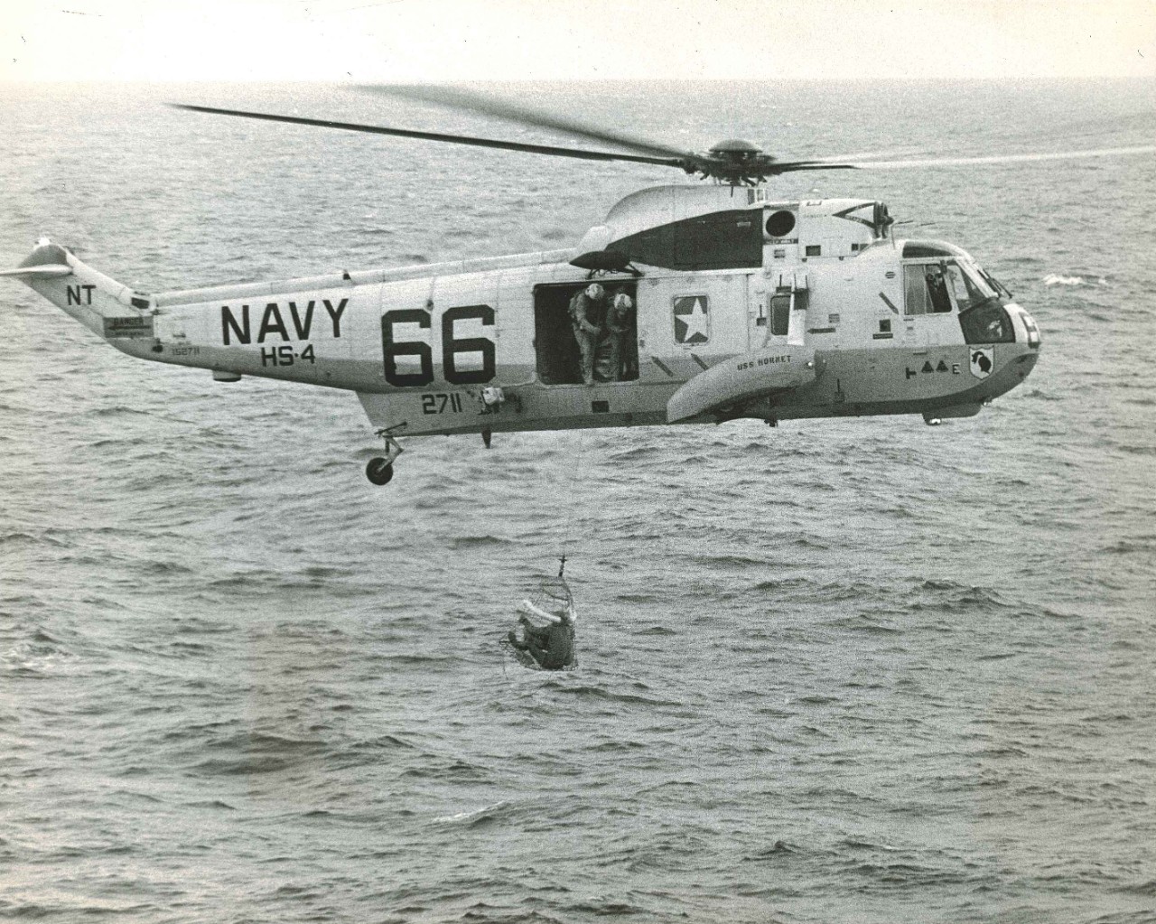 <p>Astronaut Neil Armstrong is hoisted into a helicopter during the Apollo 11 recovery&nbsp;</p>
