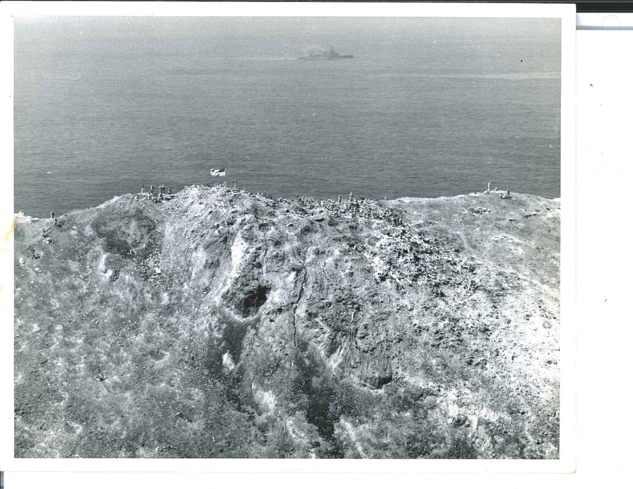 <p>Distant view of American flag on Mount Suribachi, Iwo Jima</p>

