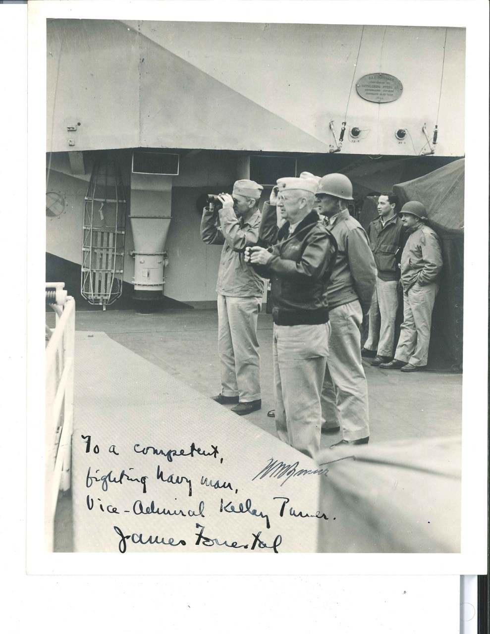 <p>Navy and Marine Corps leadership aboard USS Eldorado (AGC-11) during Iwo Jima campaign. Photo is signed by James Forrestal: &quot;To a competent, fighting Navy Man, Vice-Admiral Kelly Turner.&quot;</p>
