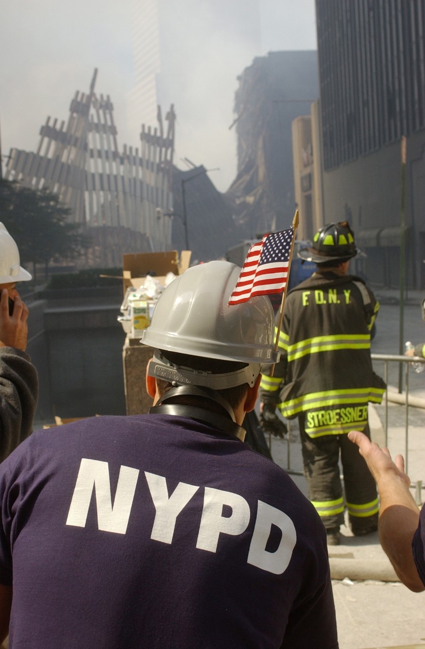New York City police and fire personnel work at Ground Zero in New York City following the attacks on 9/11, 15 September 2001