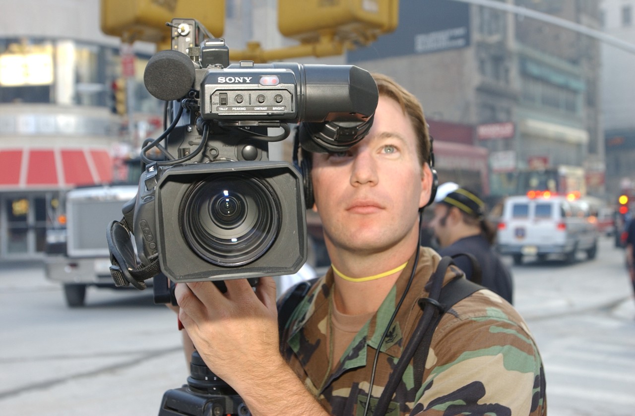 A Navy combat photographer documents the scene at Ground Zero in New York City following the attacks on 9/11, 15 September 2001