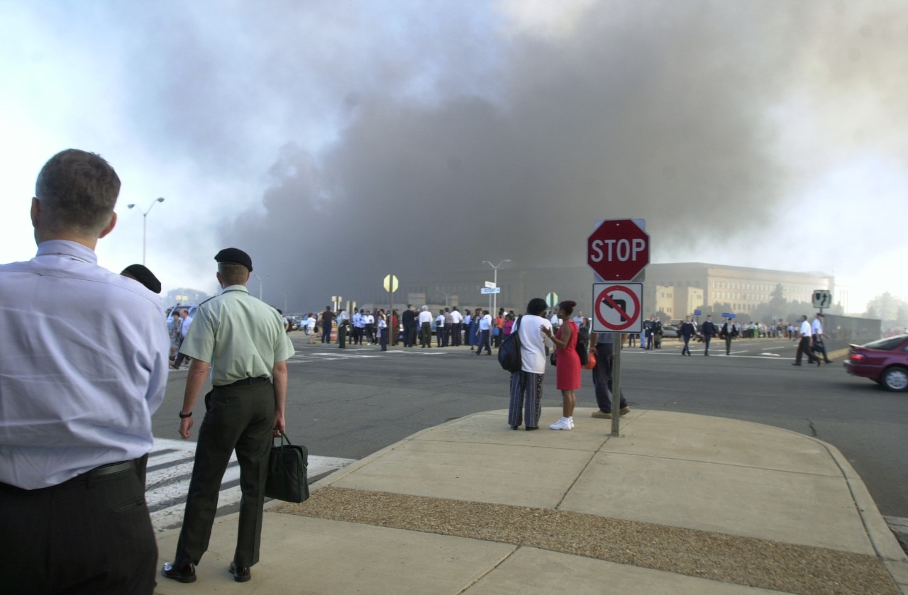 Pentagon employees gather in the South Parking Lot following the attack, 11 September 2001