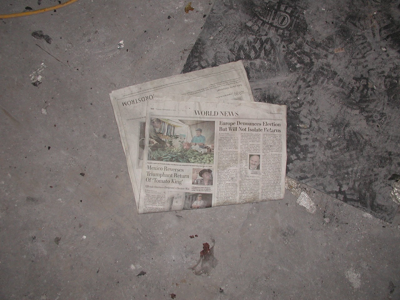A newspaper dated September 11, 2001 left behind by the crews clearing the Navy Command Center spaces, 10 October 2001