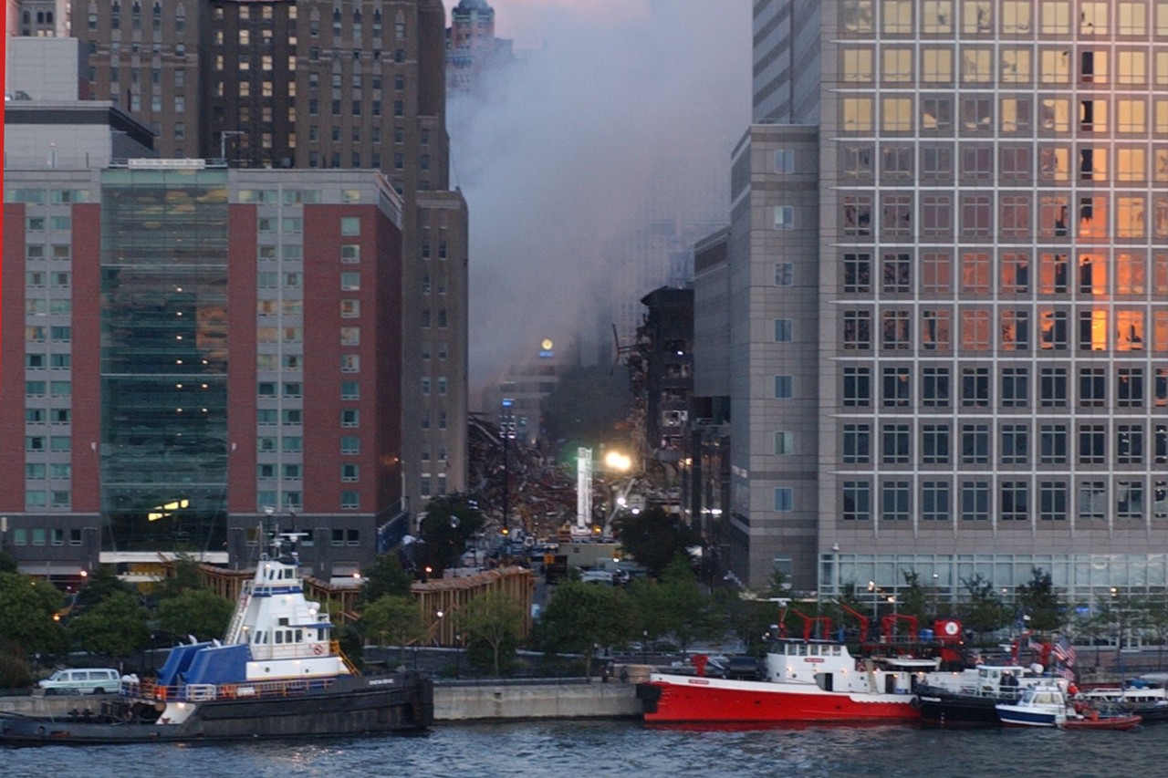 The wreckage of the World Trade Center collapse as seen from aboard USNS COMFORT (T-AH 20) on 14 September 2001