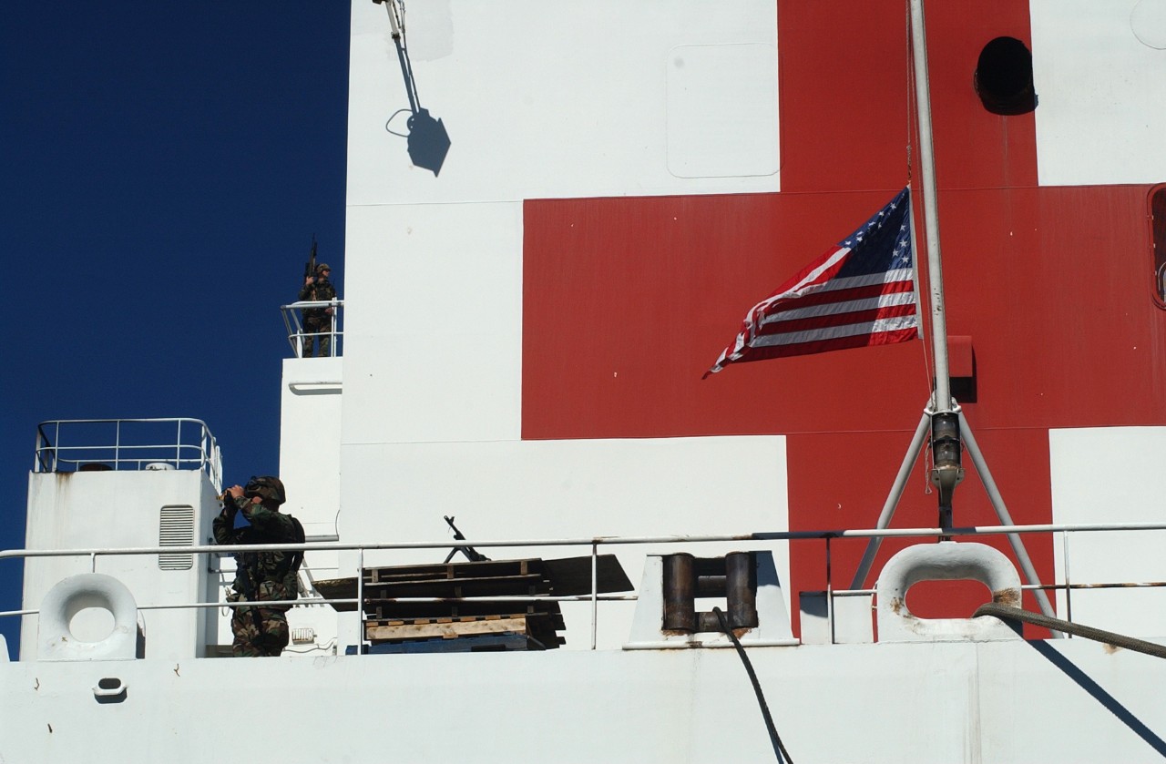 Standing watch aboard the USNS COMFORT (T-AH 20) while the hospital ship is docked at Pier 92 in New York City on 16 September 2001