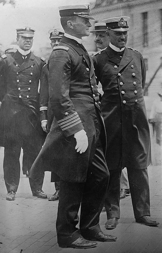 Photograph shows then Captain Thomas S. Rodgers (Center) among a group of U.S. Naval officers around 1915. (Source: Flickr Commons project, 2015).  Available at Library of Congress, LC-B2- 4122-11 [P&P].