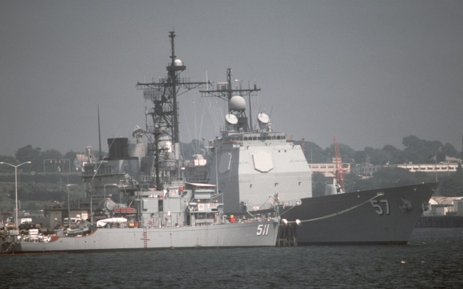 Affray and guided missile cruiser Lake Champlain (CG-57) squeeze into their mooring stations at Newport, 31 July 1988. (PH2 Jeff Elliott, Department of Defense Photograph 330-CFD- DN-ST-89-01419, Record Group 330 Records of the Office of the Secretary of Defense, 1921–2008, National Archives and Records Administration)