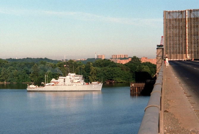 The ship approaches the draw of the Woodrow Wilson Bridge as she reaches Washington, D.C. (Don S. Montgomery, Department of Defense Photograph 330-CFD-DN-SC-83-11894, Record Group 330 Records of the Office of the Secretary of Defense, 1921–2008, National Archives and Records Administration)