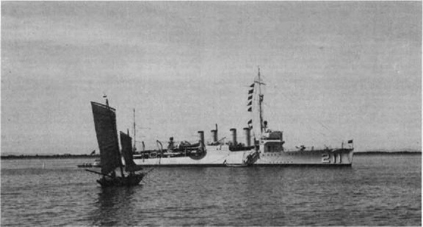 Alden (Destroyer No. 211) at Chefoo, China, 1 January 1937, with a small fishing junk in the foreground. (NH 101678)