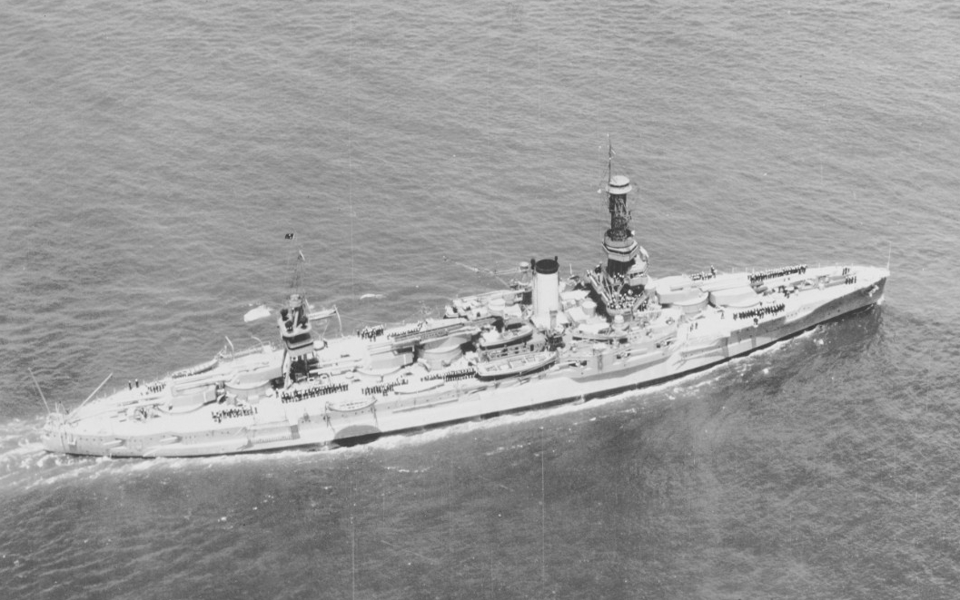 An overhead view of the battleship, her crew at quarters, shows her gracefully slicing through the waters off the Virginia capes during the Presidential Review, 19 May 1930. (Naval History and Heritage Command Photograph NH 73764)