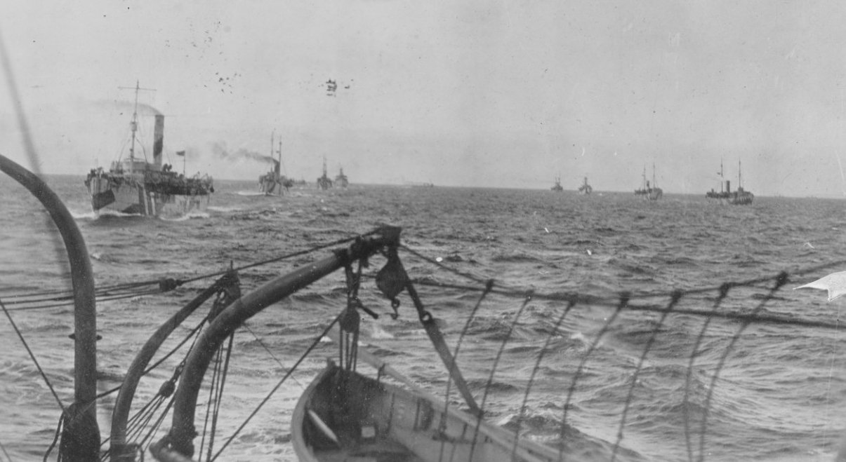 U.S. Mine Laying Fleet steaming in two parallel columns of four, during the laying of the North Sea Mine Barrage, September 1918. Right column: Roanoke, Housatonic, Quinnebaug, and Baltimore. Left Column: Canonicus, Canandaigua, Aroostook (Id. No. 1256) and Saranac  (Naval History and Heritage Command Photograph)