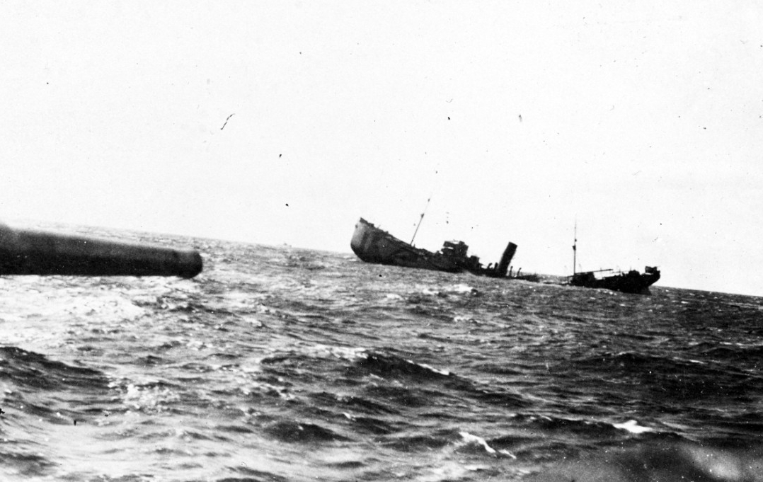 Torpedoed and sinking, the British steamship City of Glasgow in the Irish Sea, 1 September 1918. Photographed from Beale, which rescued her crew. (Naval History and Heritage Command Photograph NH 61498)