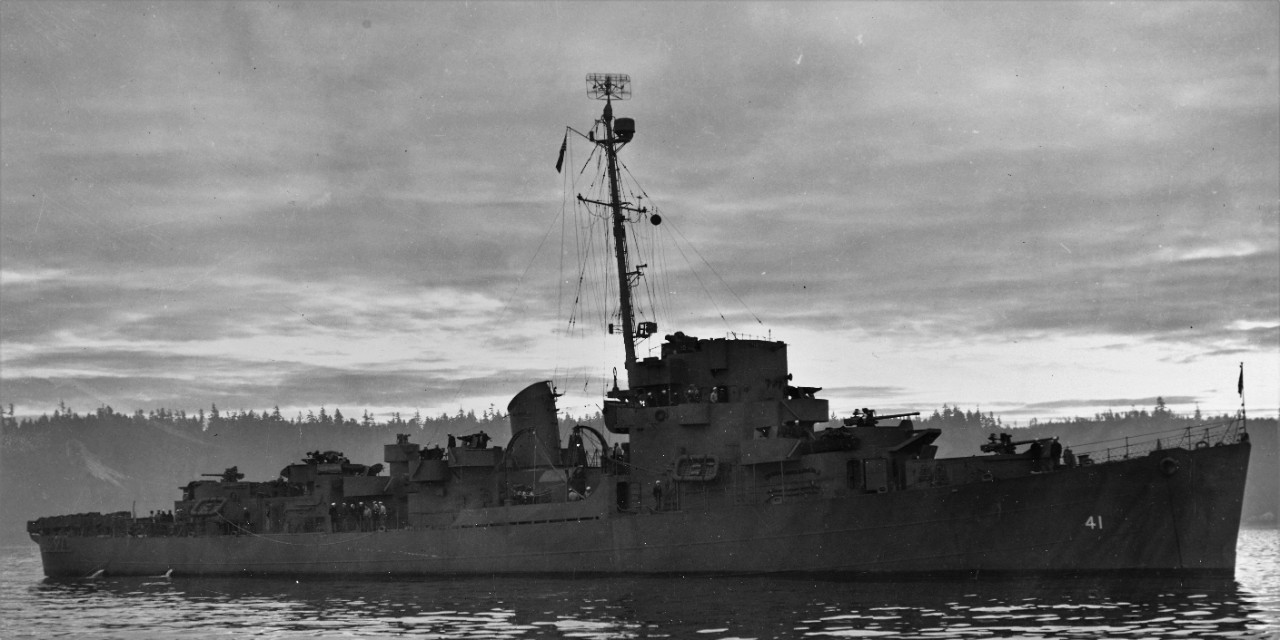 Brackett, painted in what is most likely Measure 21, Navy Blue, lies at anchor near the Puget Sound Navy Yard, 1 November 1943. (U.S. Navy Bureau of Ships Photograph 19-N-53904, National Archives and Records Administration, Still Pictures Divisio...