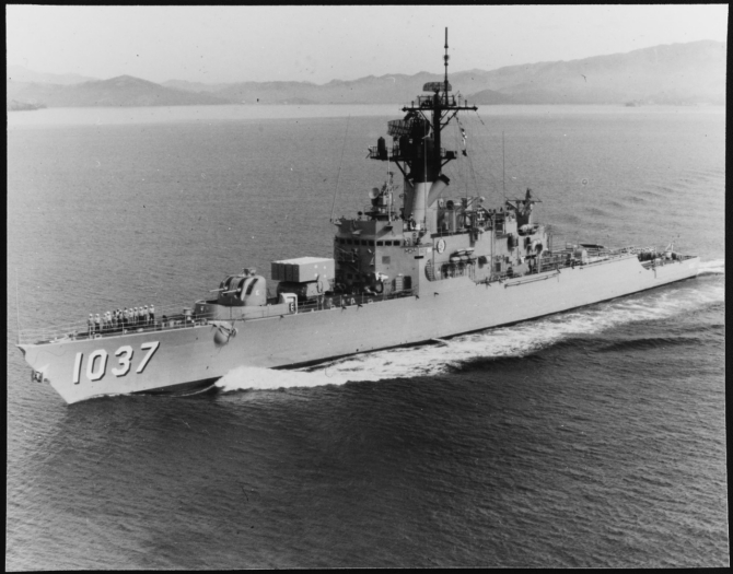 Bronstein, her crew at quarters, steams at sea off the coast of California during the late 1980s. (Berle Spurlock, donated to the Fleet Audio Visual Center, NAS Miramar, Calif., U.S. Navy Photograph NH 107502, Naval History and Heritage Command)