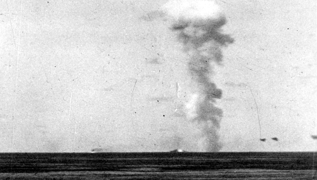 Brownson exploding after being hit by Japanese bombs while covering the landings on Cape Gloucester, New Britain, 26 December 1943. Clip from a movie film (very grainy). (U.S. Navy Photograph 80-G-240245, National Archives and Records Administration, Still Pictures Division, College Park, Md.)