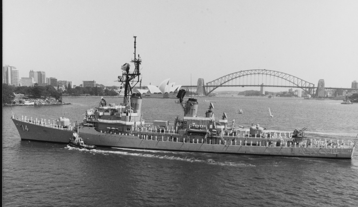 Buchanan visits Sydney, Australia, 1985. The Sydney Opera House and Sydney Harbour Bridge rise in the background. (Naval History and Heritage Command Photograph NH 106737)