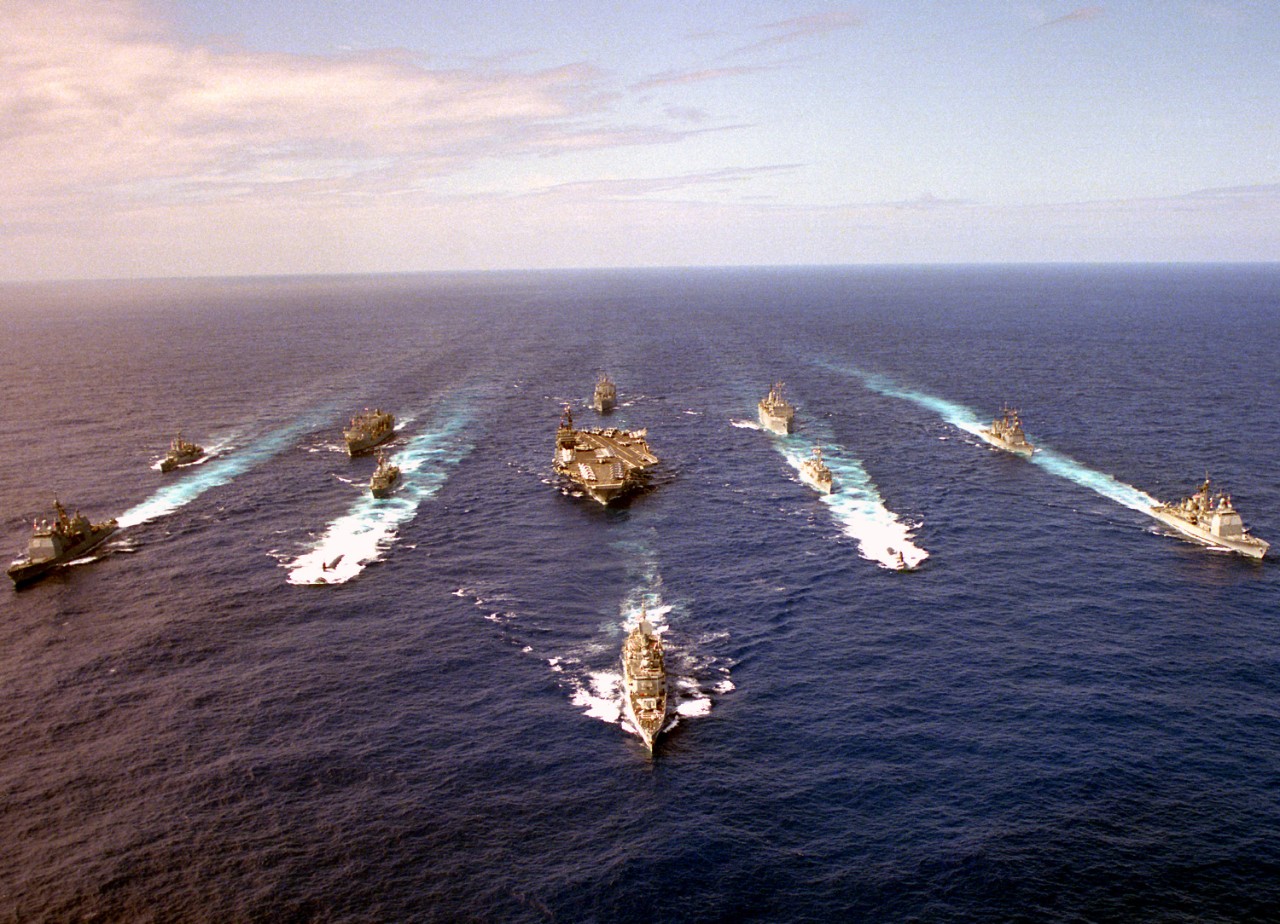 Capodanno sails in company with other members of the John F. Kennedy (CV-67) Battle Group en route to the Mediterranean for her final deployment, 16 October 1992. Other members of the battle group include Albuquerque (SSN-706), Seahorse (SSN-669), Gettysburg (CG-64), Leyte Gulf (CG-55), Wainwright (CG-28), Caron (DD-970), Halyburton (FFG-40), McInerney (FFG-8), Puget Sound (AD-38), Santa Barbara (AE-28), and Kalamazoo (AOR-6). (U.S. Navy Photograph by CW02 Kenneth H. Brewer, Defense Imagery Management Operations Center, Ft. Meade, Md., DN-SC-93-00852)