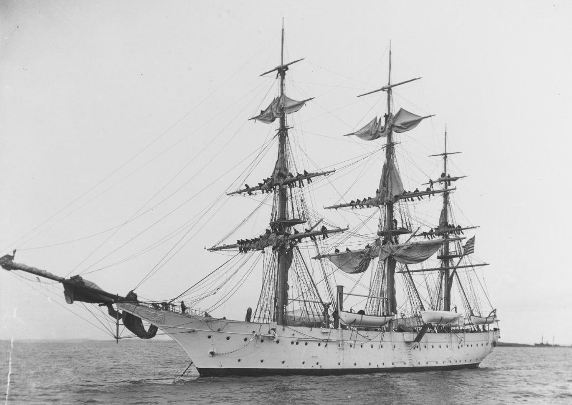 Midshipman furl sails on board Severn as they prepare the Naval Academy training ship for disposal, 18 December 1916. (Naval History and Heritage Command Photograph 19-N-18-12-16)