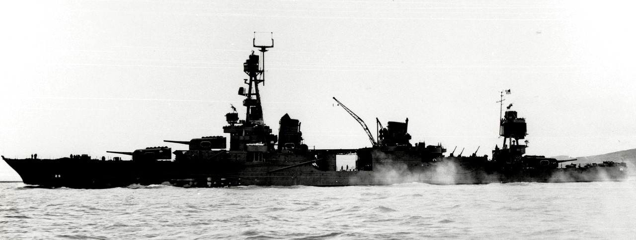 Chicago emerges from her work at Mare Island Navy Yard, 20 December 1942. The censor erases key equipment including her radar antenna, but the ship’s silhouette stands out cleanly against the wan winter sky. (U.S. Navy Photograph 8011-42, National Archives and Records Administration, Still Pictures Branch, College Park, Md.)
