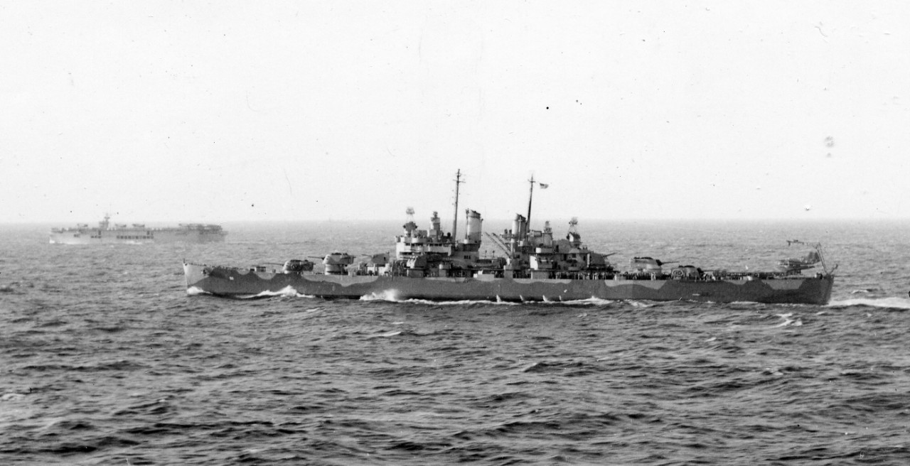 Cleveland carrying out screening duties during Operation Torch in November 1942, as seen from aircraft carrier Ranger (CV-4). Auxiliary carrier Suwanee (ACV-27) is in the background. (U.S. Navy Photograph 80-G-30223, National Archives and Records Administration, Still Pictures Branch, College Park, Md.)