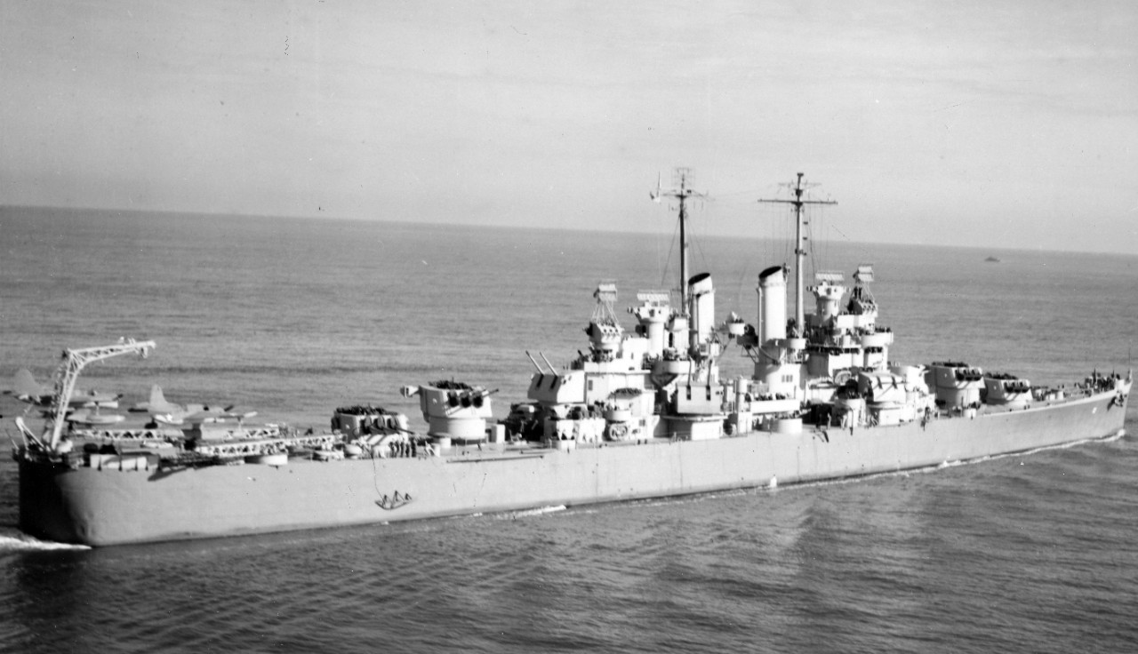 Cleveland departing Naval Operating Base Norfolk on 5 December 1942, en route to the Panama Canal for transit to the Pacific Theater. Note the Curtiss SO3C Seamew scout observation seaplanes on her stern catapults. (U.S. Navy Photograph 80-G-38885, National Archives and Records Administration, Still Pictures Branch, College Park, Md.)