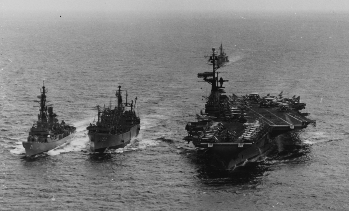 Cochrane, left, underway with Aludra (AF-55) and Midway (CVA-21) in the South China Sea. 15 May 1965. (Naval History and Heritage Command Photograph NH 104027)