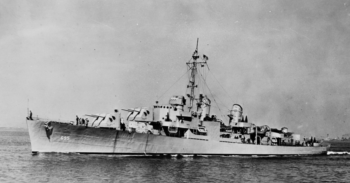 Cooper circa March 1944, prior to her receiving disruptive camouflage and showing her bridge as originally built. Wartime censors have retouched the image to obscure radar antennas on the foremast and atop the Mk. 37 director. (Naval History and Heritage Command Photograph NH 55382)