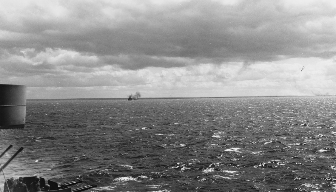 U.S. warships bombard German positions on Utah Beach during the invasion of Normandy on 6 June 1944. Photograph taken from on board Quincy (CA-71). (U.S. Navy Photograph 80-G-231957, National Archives and Records Administration, Still Pictures Di...