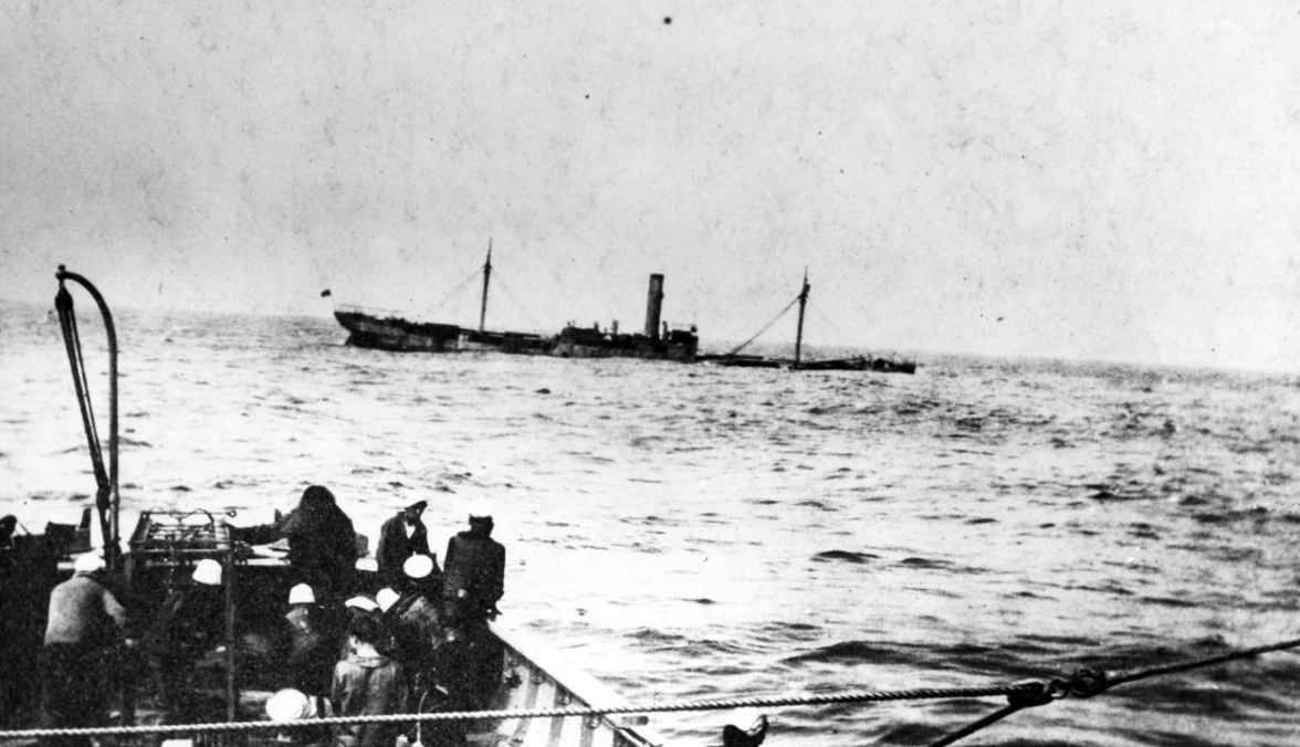 After striking a mine in the Bay of Biscay on 22 June 1918, Californian can be seen sinking. Photographed from Corsair, the latter ship’s stern is visible in the foreground. (Naval History and Heritage Command Photograph NH 61072)