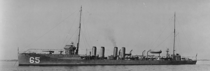 Broadside view of Davis in Hampton Roads, 10 December 1916, clearly showing her main and secondary battery, with 4-inch guns on the foc’sle deck and on the main deck aft, with 1-pounder antiaircraft guns mounted forward of the bridge and atop the deckhouse, aft. Her port side torpedo tube mounts are in the shadows. (U.S. Navy Bureau of Ships Photograph 19-N-1931, National Archives and Records Administration, Still Pictures Branch, College Park, Md.)