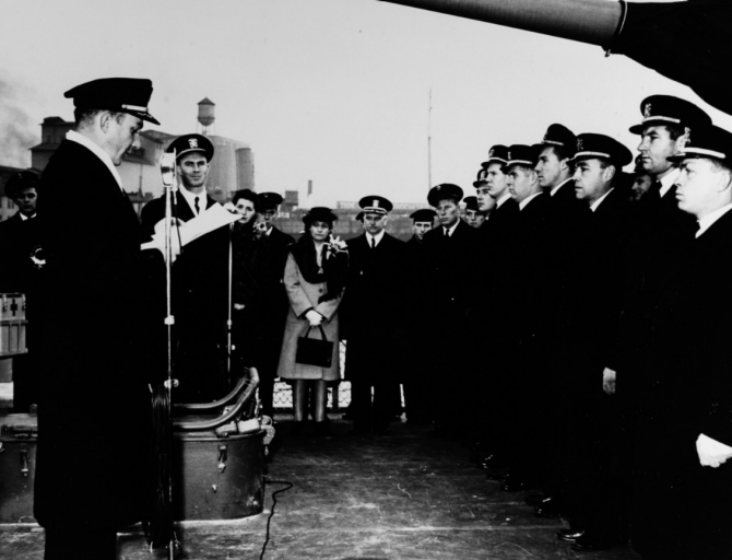 Men of the ships company proudly stand tall while Pitts reads his orders as he assumes command of Douglas H. Fox at Seattle, Wash., 26 December 1944. (Unattributed U.S. Navy Photograph NH 67424, Photographic Section, Naval History and Heritage Command)