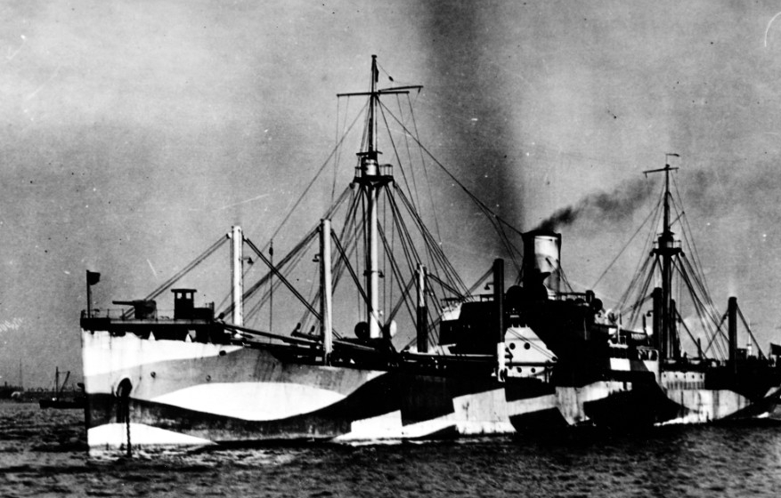 Painted in “dazzle” camouflage, F. J. Luckenbach, circa 1918, lies at anchor. Her forward gun platform is clearly visible. (Naval History and Heritage Command Photograph NH 45880)