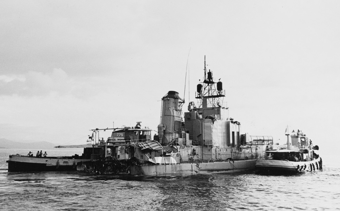 Wauwatosa (left) and Wallacut (right) push the wounded destroyer’s stern section across Subic Bay, 9 June 1969. (U.S. Navy Photograph 1140304, National Archives and Records Administration, Still Pictures Branch, College Park, Md.)