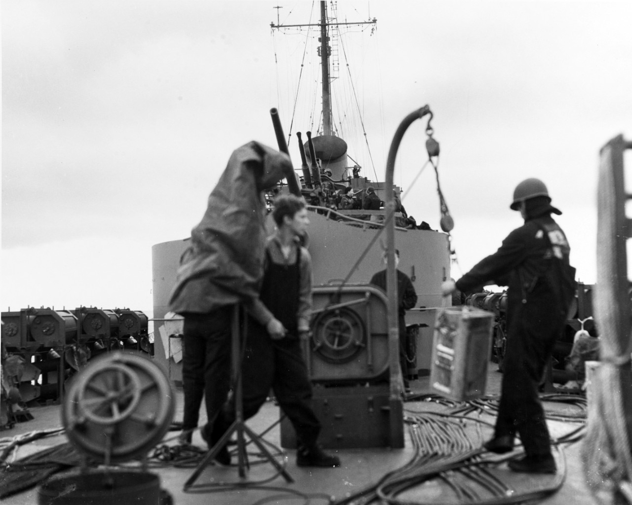 Crewmembers of Frederick C. Davis at work on the ship’s fantail, during Operation Shingle. (U.S. Navy Photograph 80-G-223466, National Archives and Records Administration, Still Pictures Division, College Park, Md.)